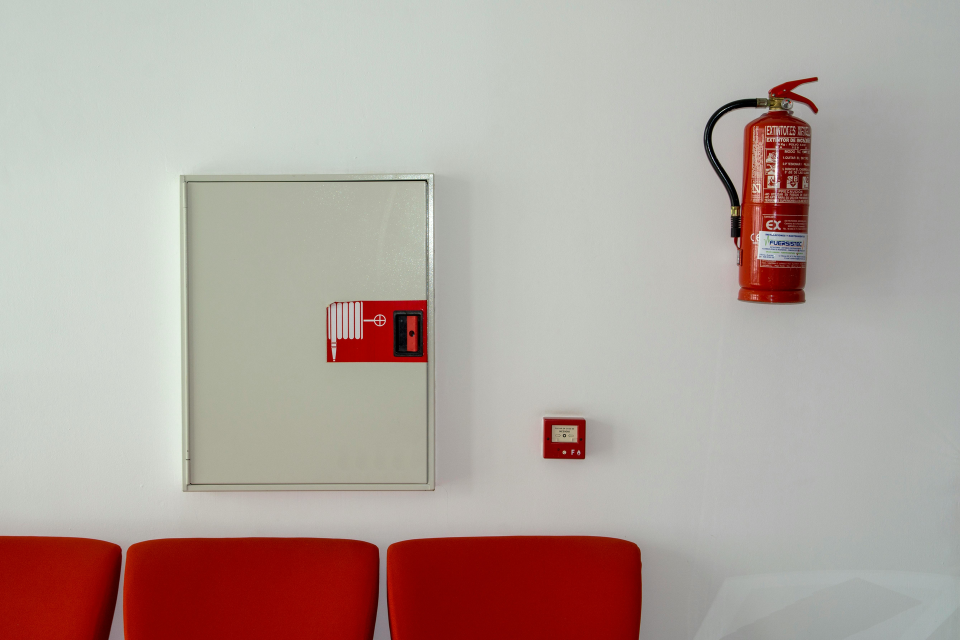 building with a fire strategy in place with fire extinguishers and alarms