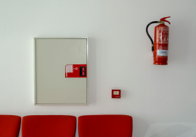 building with a fire strategy in place with fire extinguishers and alarms